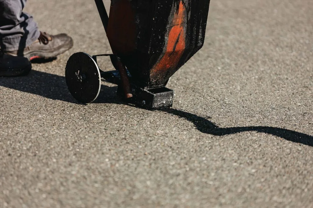 Platinum Paving does crack filling on concrete.