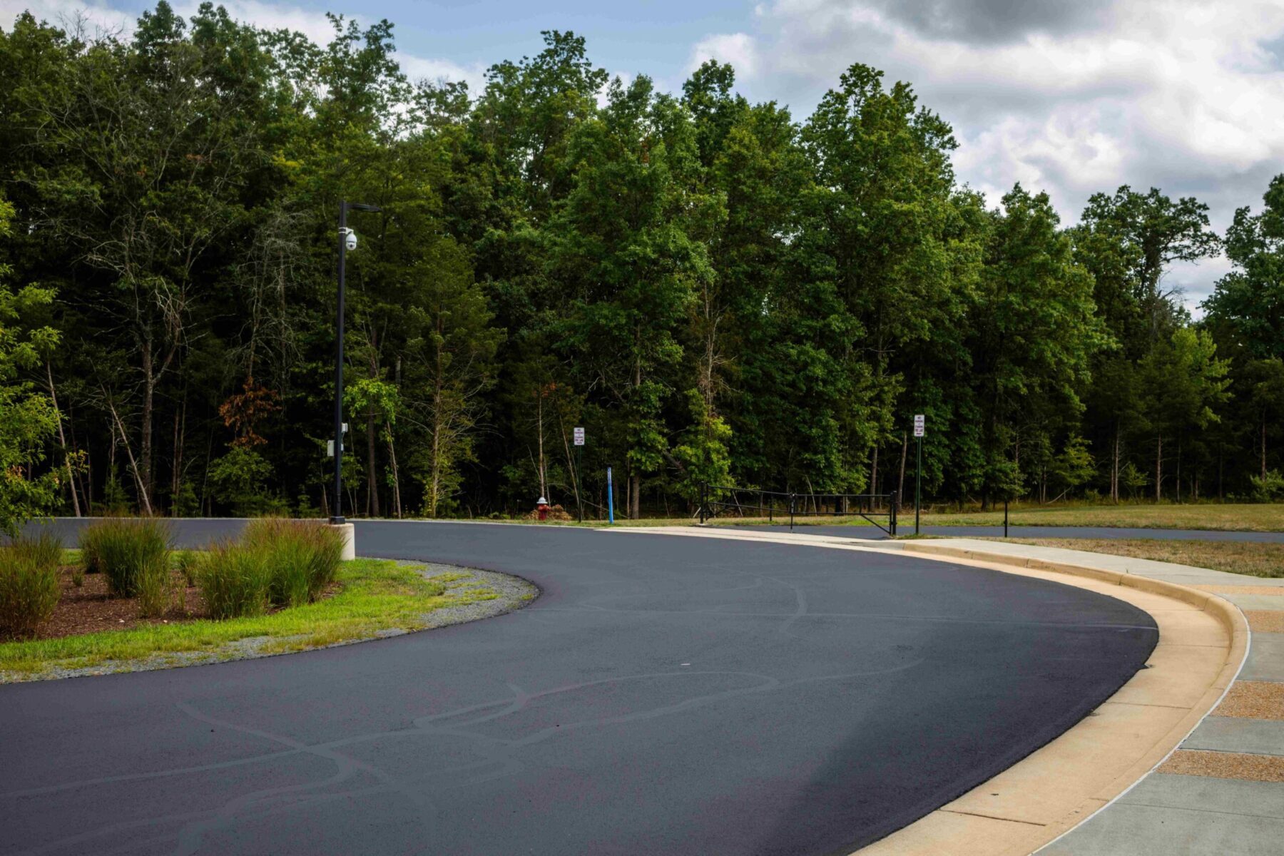 Sealcoating a road for Loudoun Country Public Schools