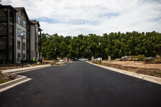 A freshly paved road at an apartment complex.