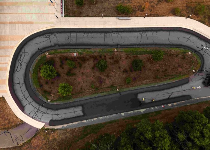 Sealcoating a road for Loudoun Country Public Schools