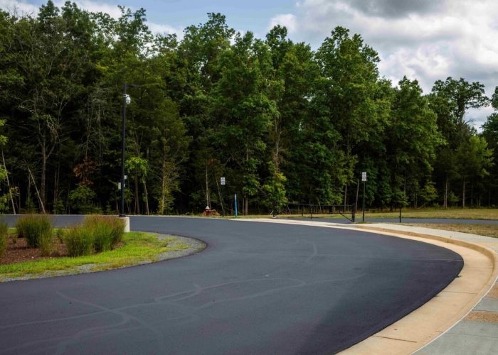 Sealcoating a road for Loudoun Country Public Schools