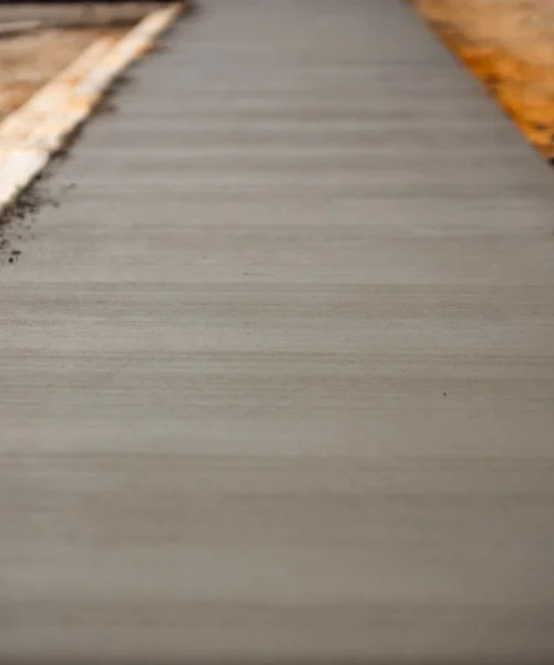 Concrete paving: a close-up of a new sidewalk.